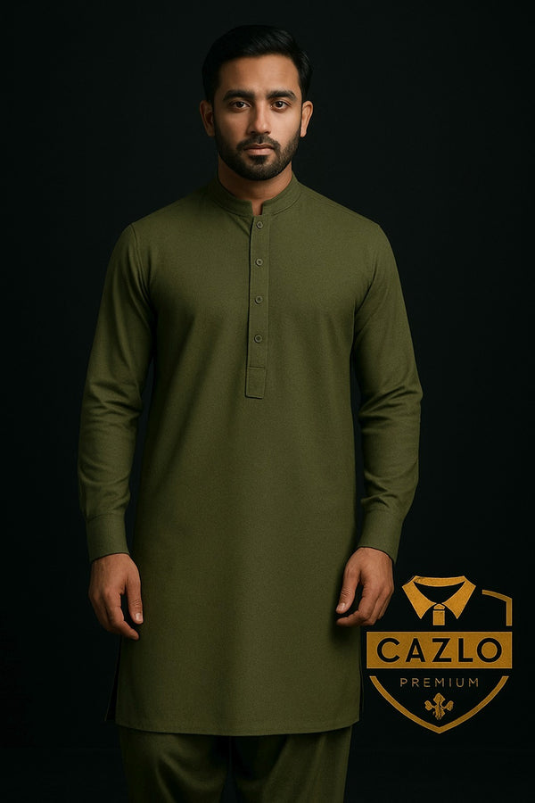 Man wearing an olive green kurta with Cazlo Premium logo on a black background